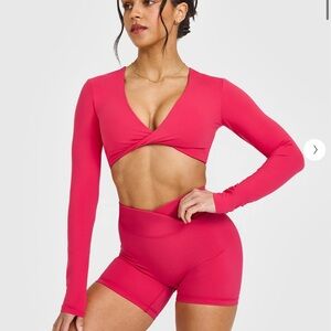 Unified Twist Front Long Sleeve Crop Top in Berry Bloom size XXL- $55